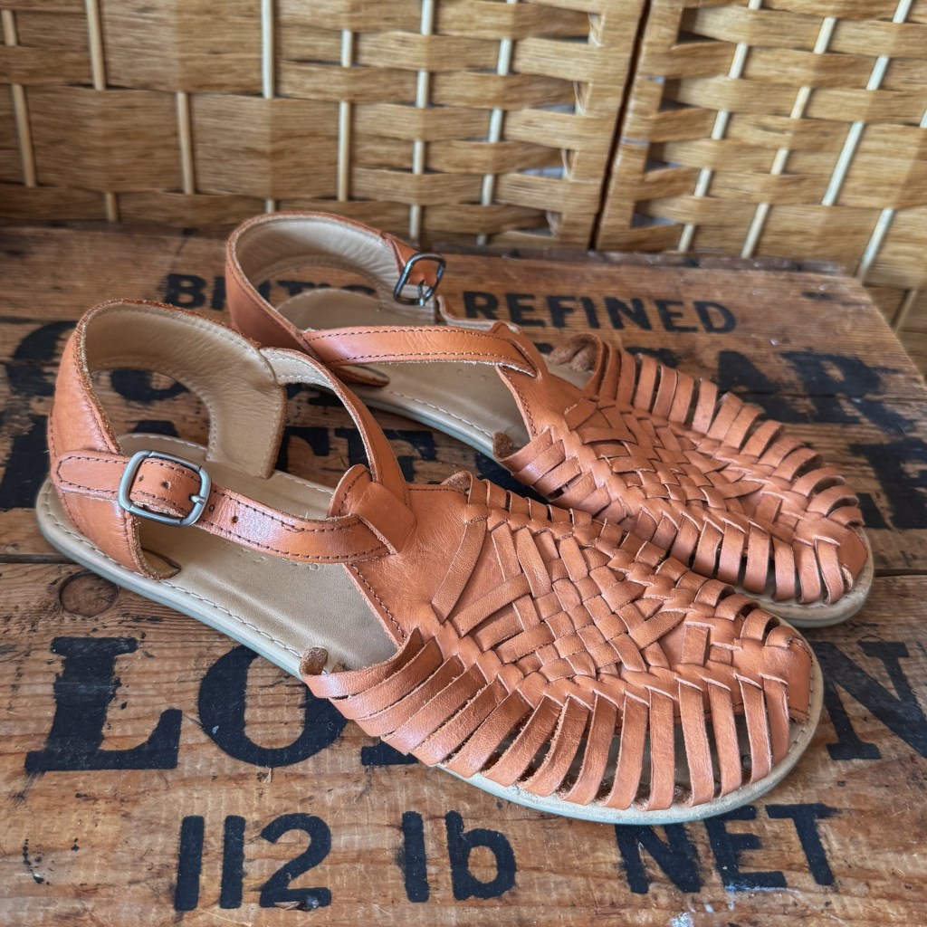 Toffee-brown Origo Huarache barefoot sandals by Anya with woven straps and a back strap.